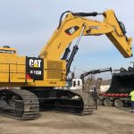 Excavator with its bucket unattached