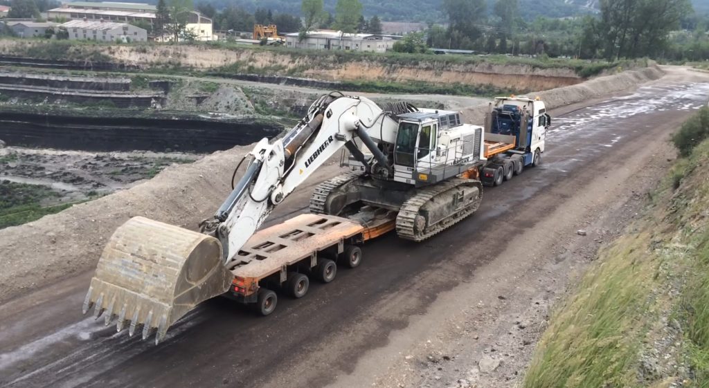 Transporting Liebherr 984C through roads of the mine