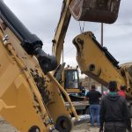 Disassembling caterpillar excavator