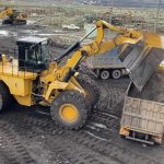 Caterpillar 992G Wheel Loader Loading Coal On Trucks