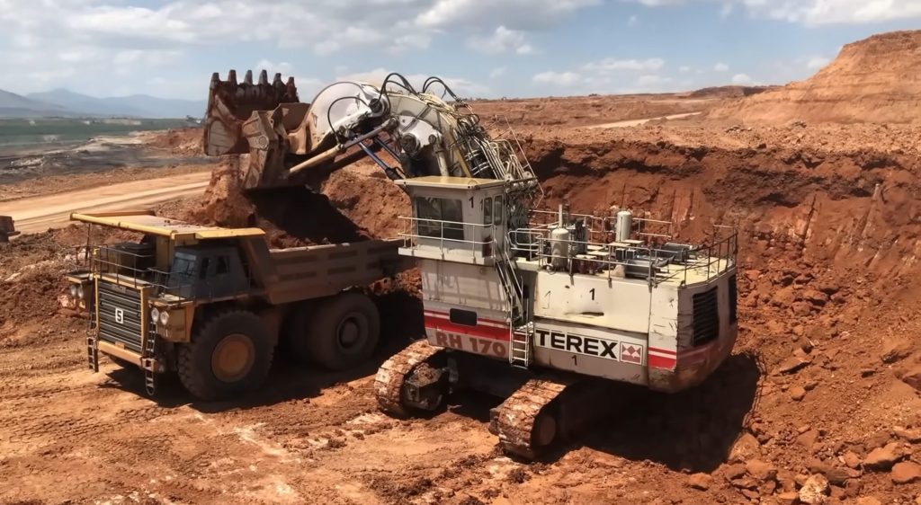 Shovel excavator loading dumper