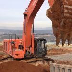 Hitachi Zaxis 670LCR Excavator Loading Truck