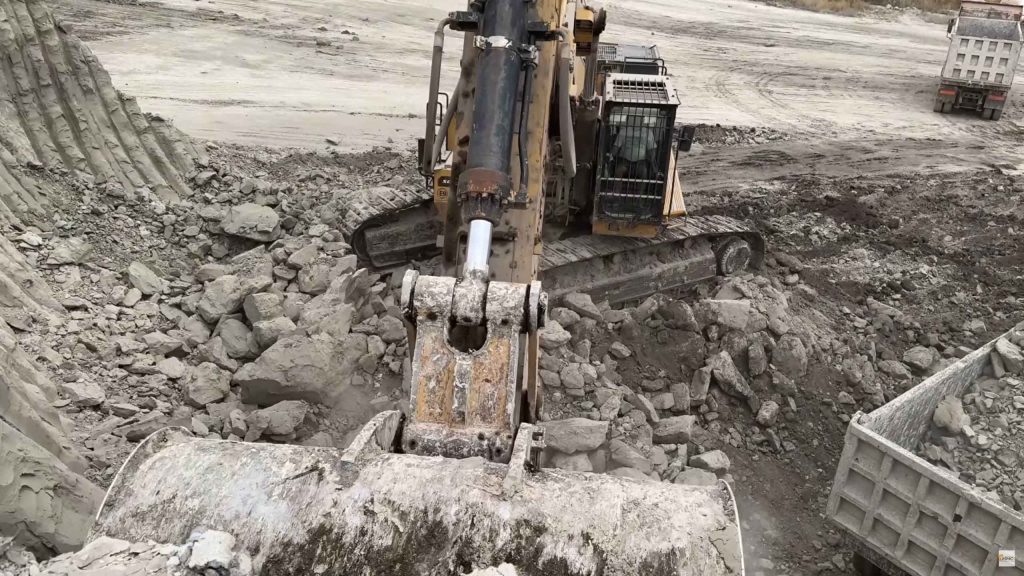 Excavator digging in construction mining