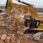 Excavator digging in construction mining