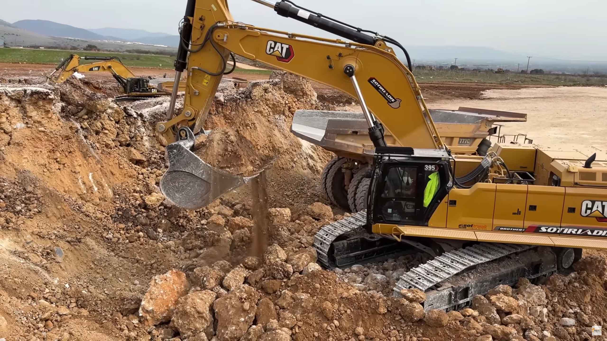 Excavator digging in construction mining