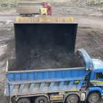 Huge Caterpillar 992G Wheel Loader Loading Coal On Trucks