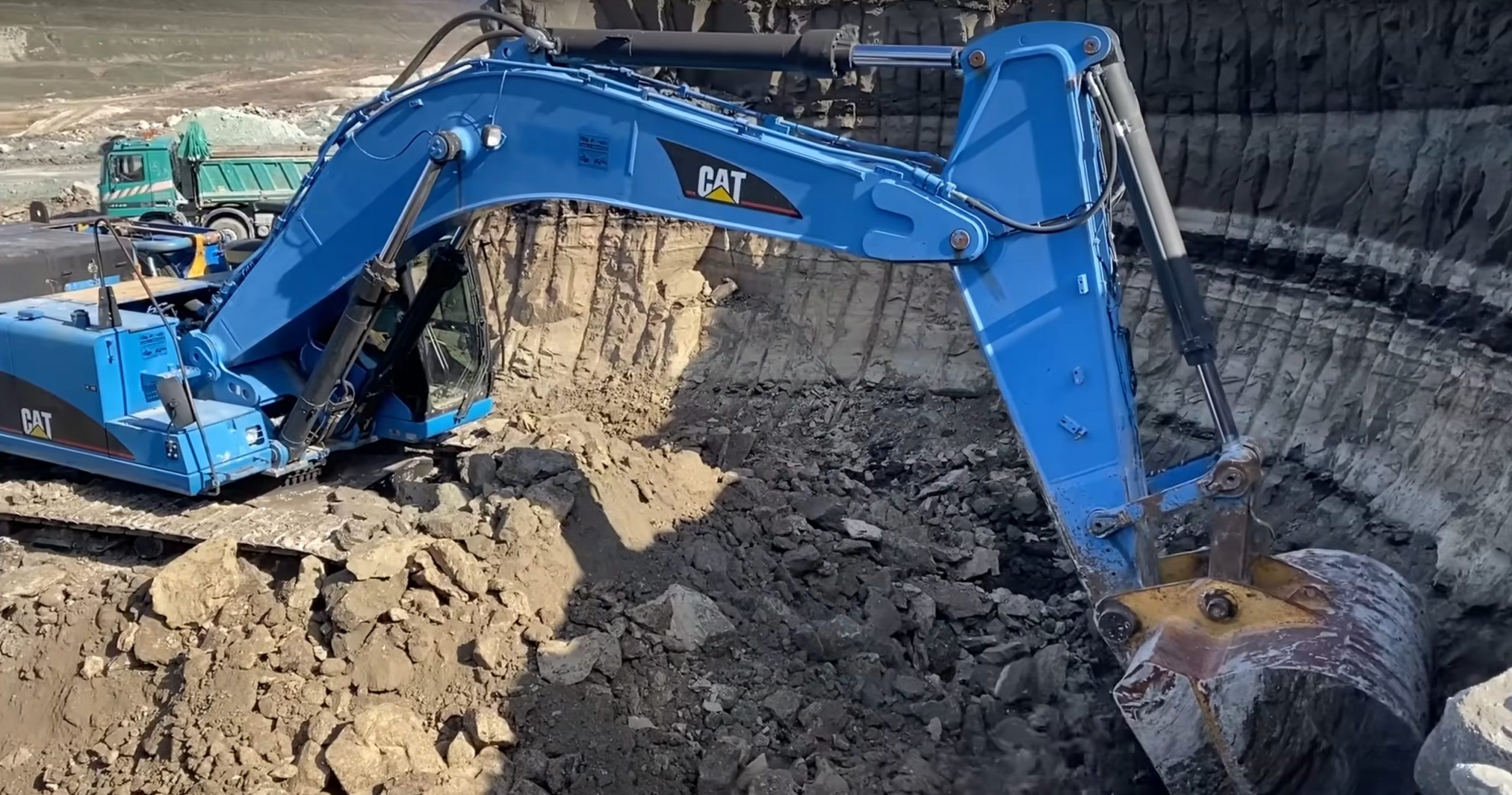 blue Caterpillar 345C Excavator