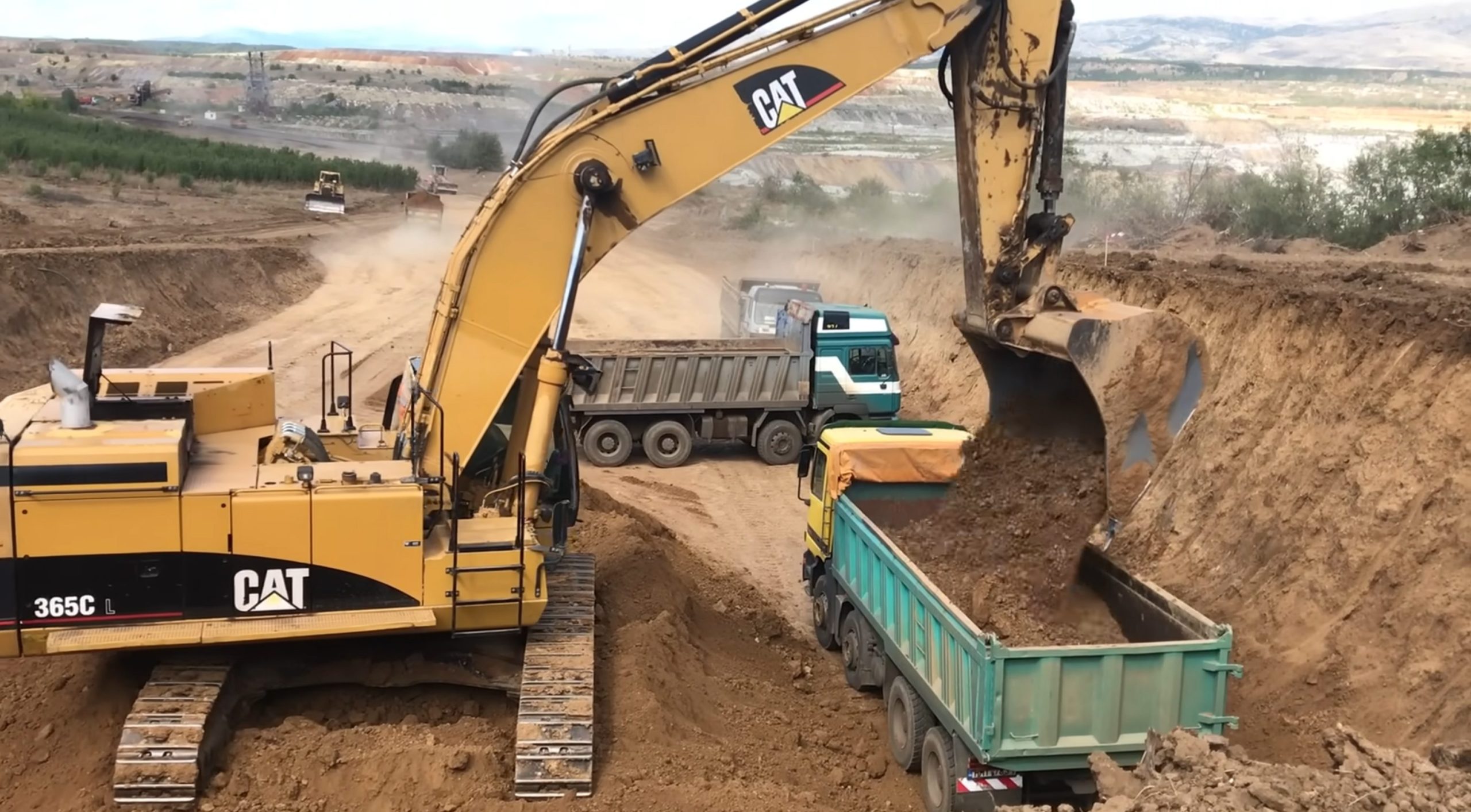 Caterpillar 365C L Excavator Loading Truck